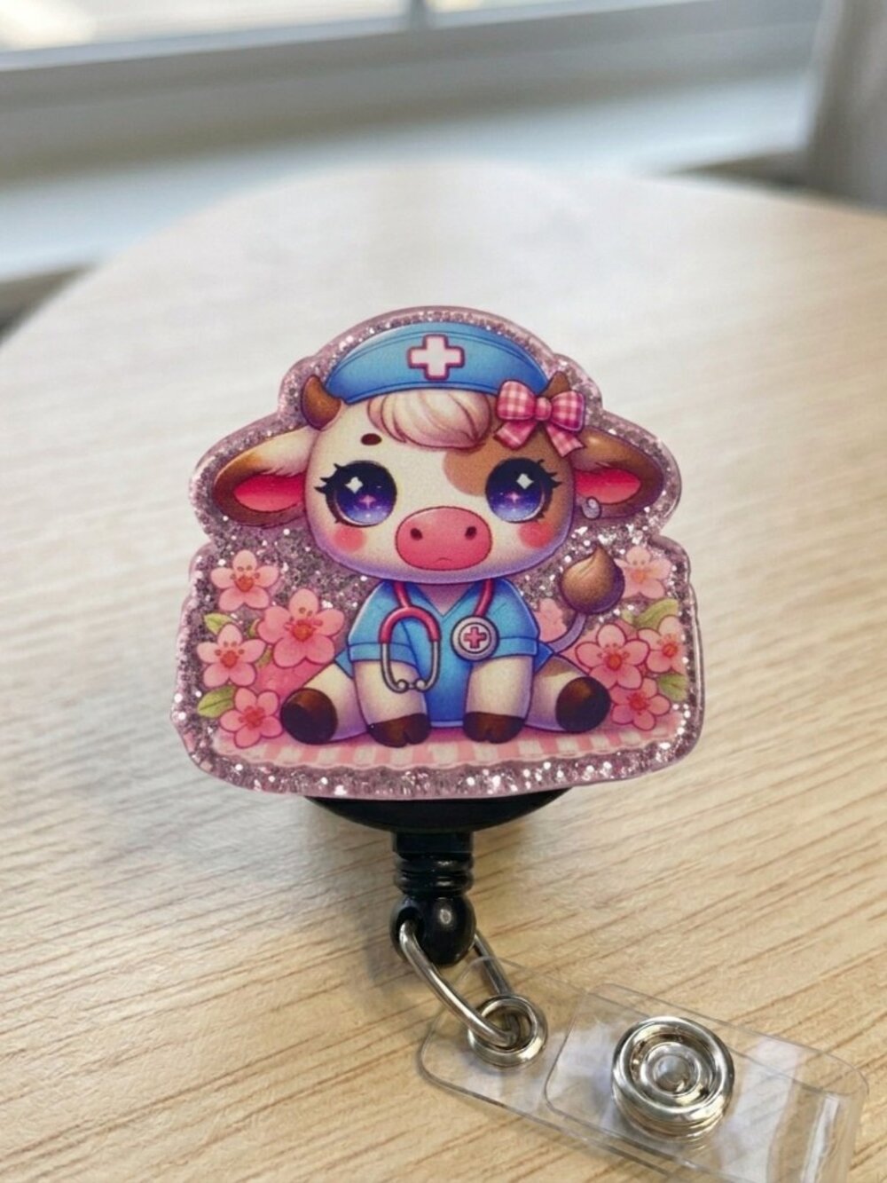 Cherry Blossom Moo-dical Scrub Cow Badge Reel